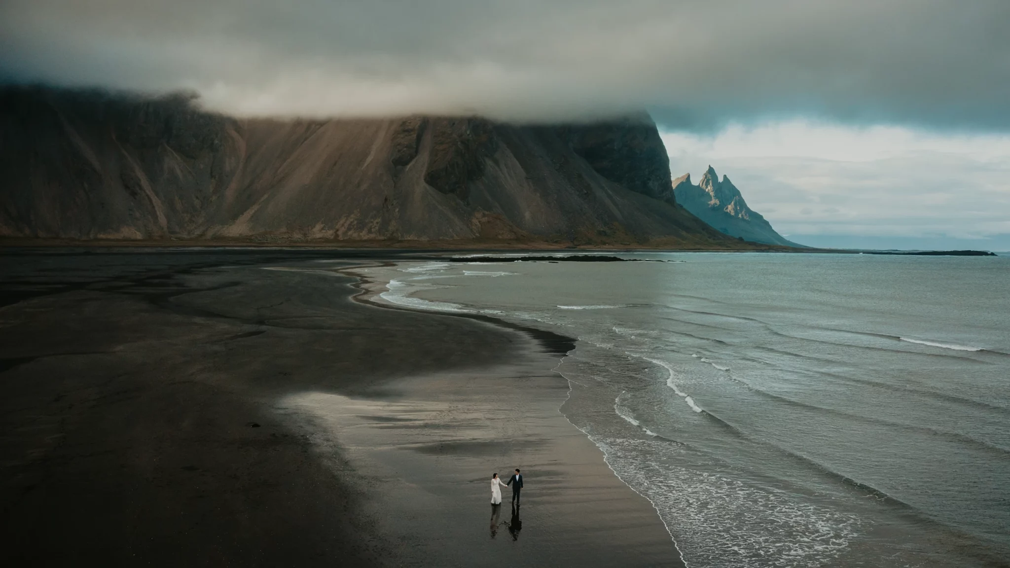 Vestrahorn and Stokksness elopement photograph of the couple  from the bird view made with a drone